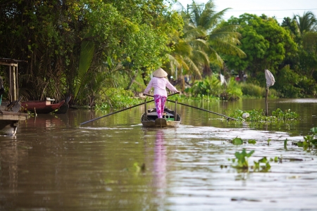 Woman in a boat.