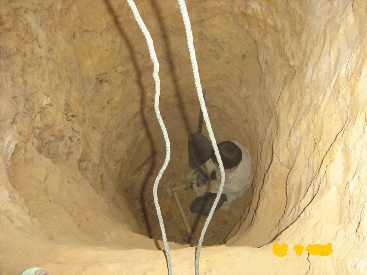 Illegal miners searching for gold at Phu Hea mining site in Pek district, Xieng Khouang province, Laos. Illegal miners searching for gold at Phu Hea mining site in Pek district, Xieng Khouang province, Laos.