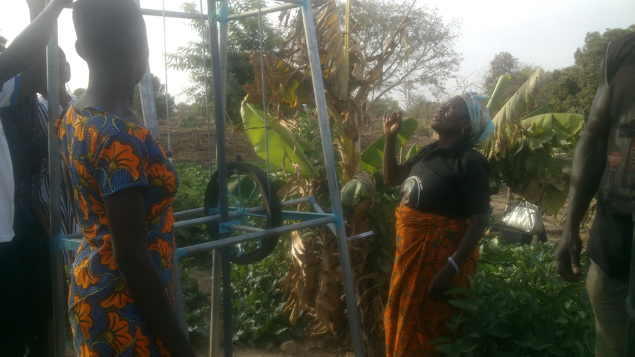 A farmer using a rope and washer pump for irrigation in Nyangua, Upper East Region, Ghana.