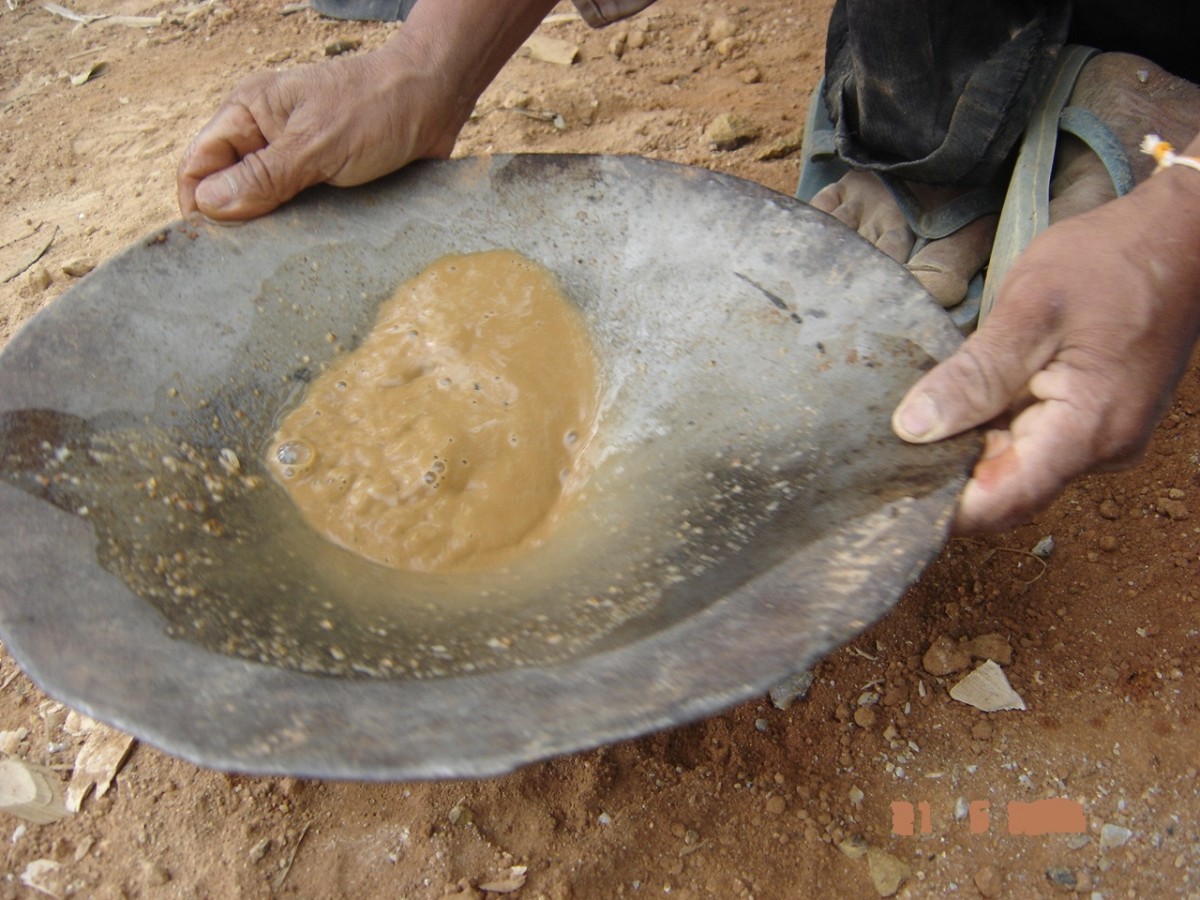 Illegal miners searching for gold at Phu Hea mining site in Pek district, Xieng Khouang province, Laos.