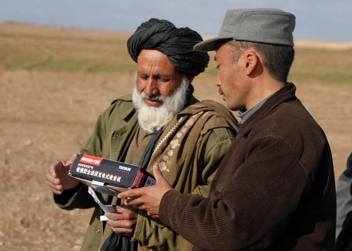 handing out radios in afghanistan