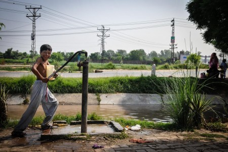 Pumping water from a tube well, Pakistan