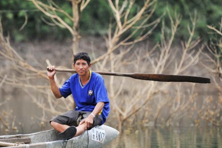 Keam Boutdala visits the site of his former village near Lack Xao, now flooded as part of a hydropower project
