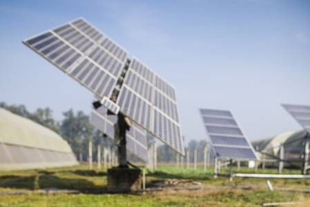 A farm with a solar water pump.